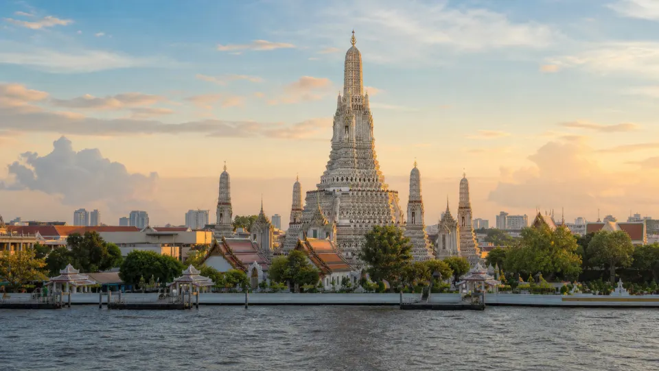Wat Arun beside the Chao Phraya River in Bangkok, Thailand